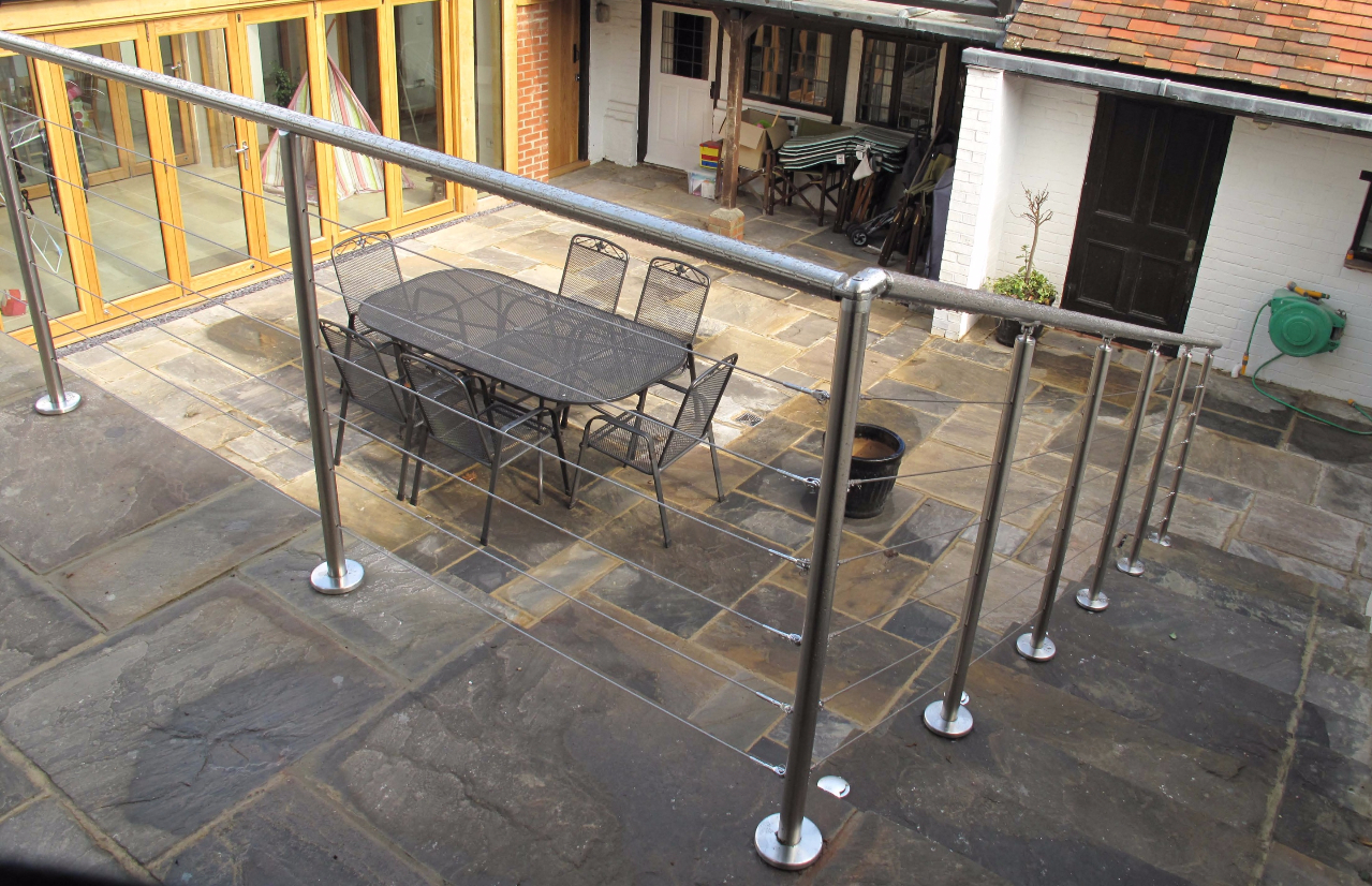  Stainless steel balustrade and handrails with wire infill 